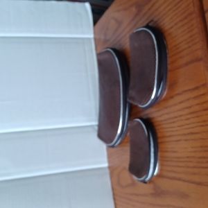 Three travel satchels